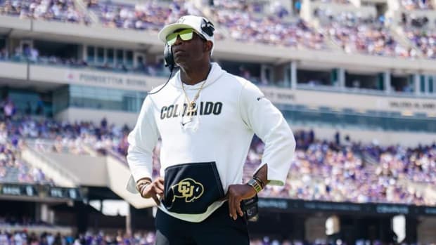 Deion Sanders on the field at Amon G. Carter Stadium